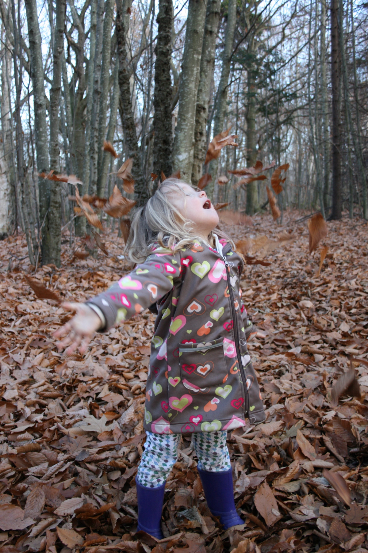 Tossing leaves at Victoria Park